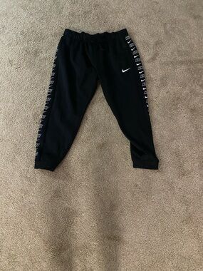 Nike Black Kids Joggers with White Swoosh & Logo Tape